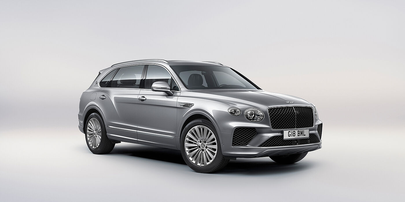 Bentley Kyiv Bentley Bentayga Extended Wheelbase luxury SUV front three quarter view in Moonbeam paint with 21 inch five spoke painted wheels