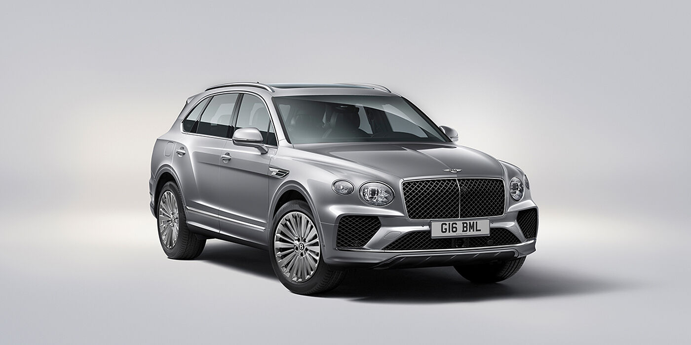 Bentley Kyiv Bentley Bentayga luxury SUV front three quarter view in Moonbeam paint with matrix grille and 21″ 5 spoke painted wheels