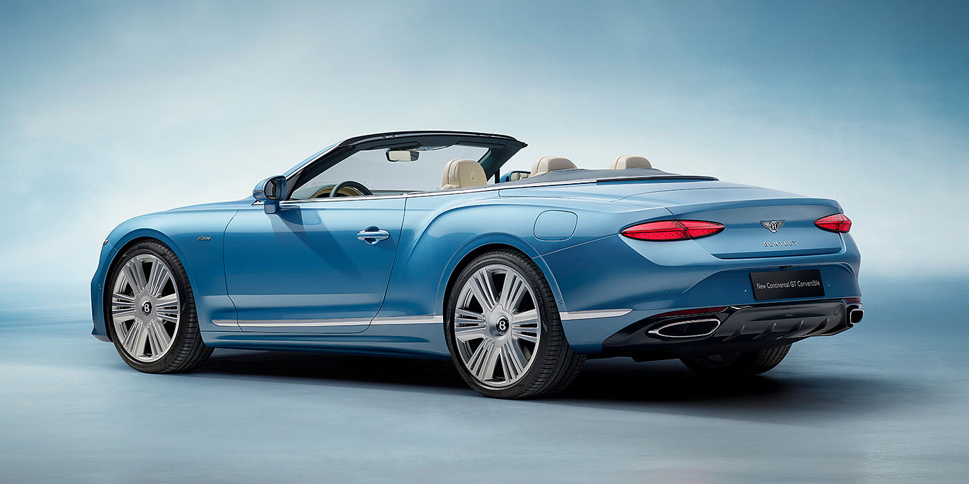 Bentley Kyiv New Bentley Continental GTC Azure convertible rear view in Light Windsor blue paint with 22 inch ten spoke wheels and chrome exterior details