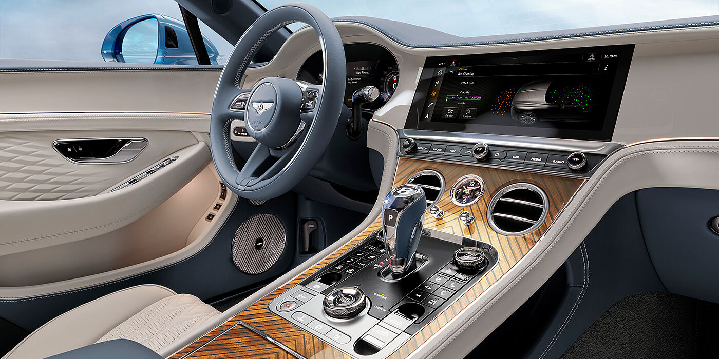 Bentley Kyiv New Bentley Continental GTC Azure convertible interior front cabin view with Linen and Brunel hides and Piano Linen by Mulliner veneer featuring centre console and centre MMI screen