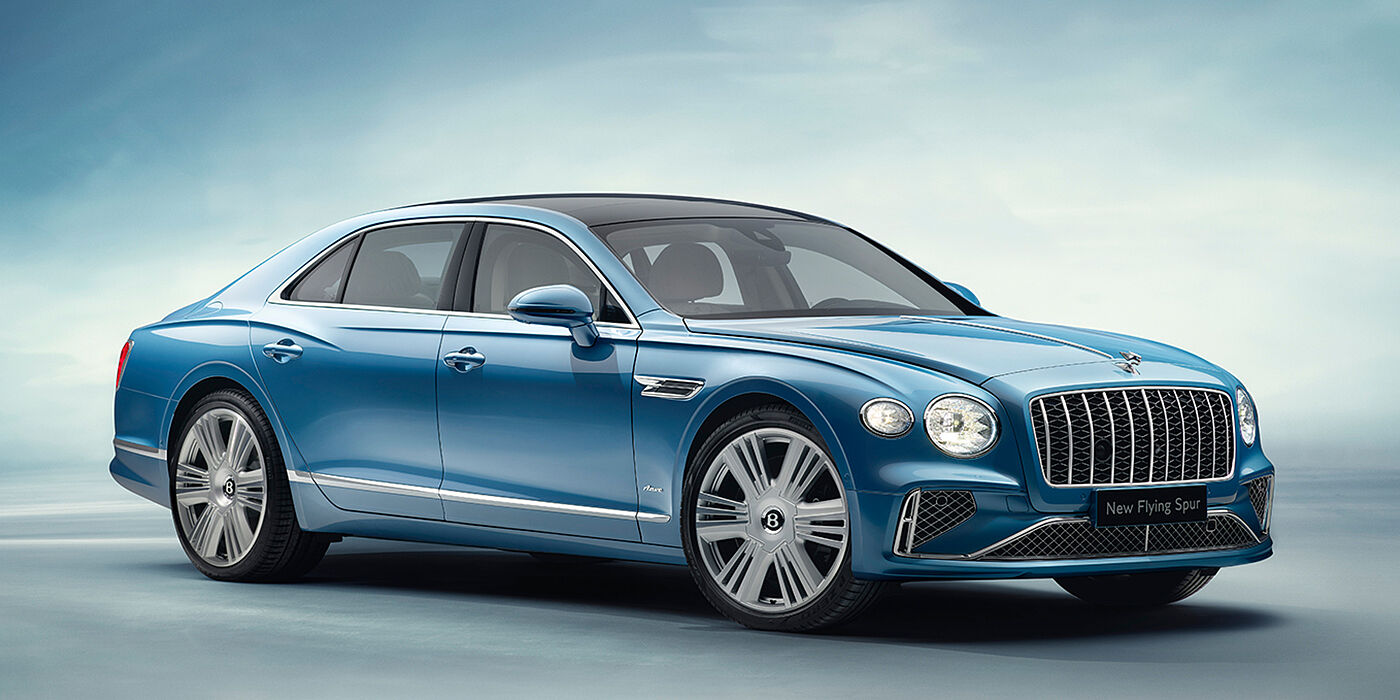 Bentley Kyiv New Bentley Flying Spur Azure sedan front view in Light windsor blue by Mulliner paint with 22 inch Azure wheels and chrome exterior details